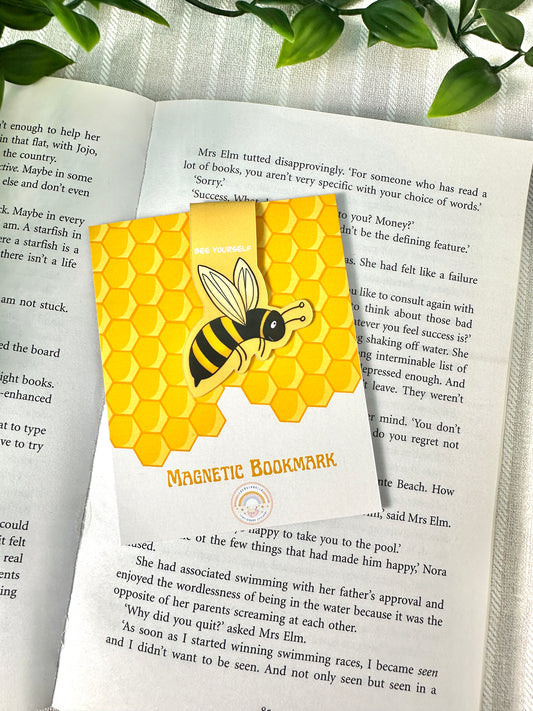 bee magnetic bookmark on book with backing card