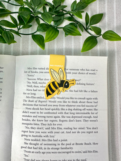 bee magnetic bookmark on the page