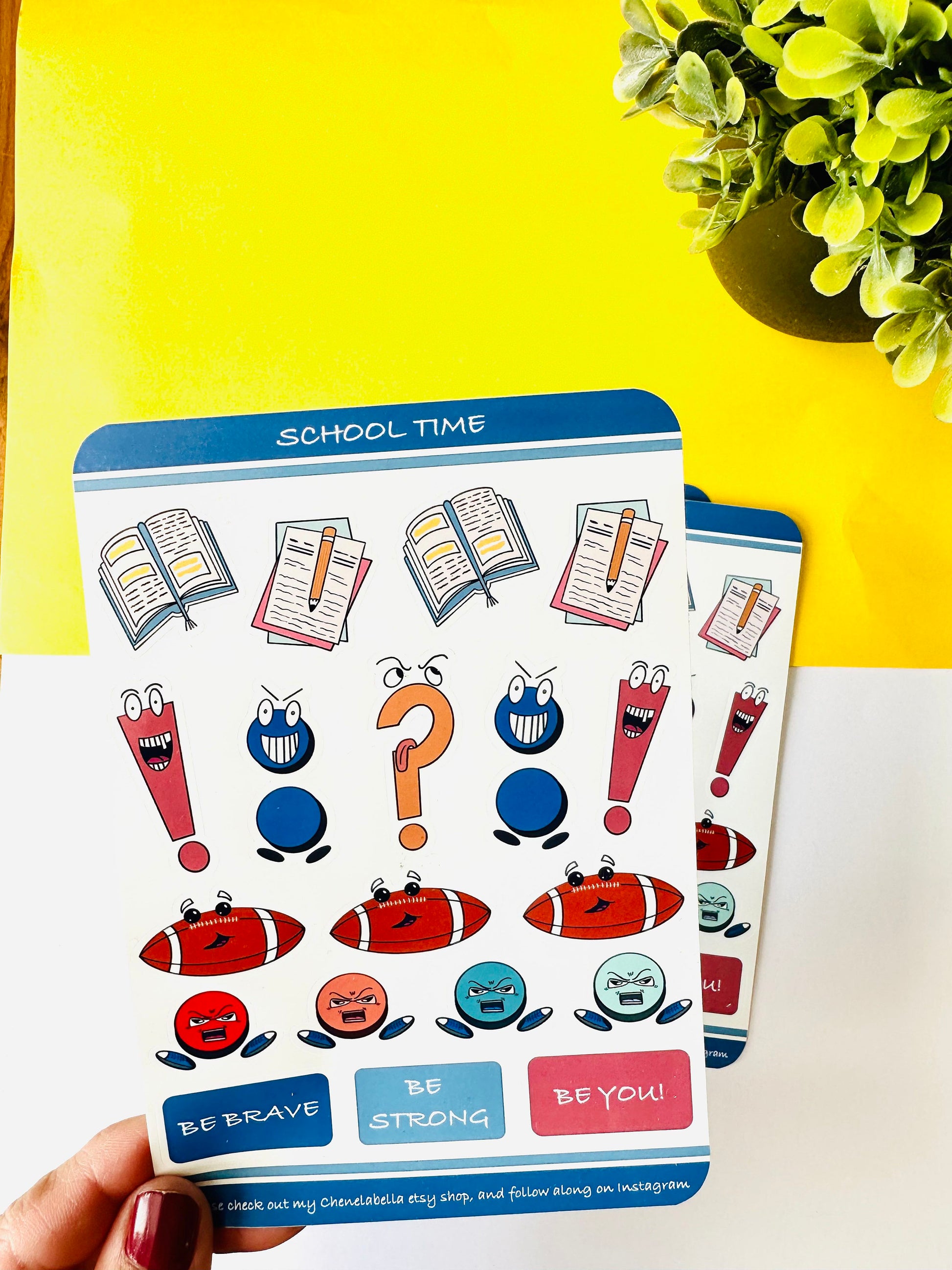 Back to school cute punctuation sticker sheet held up