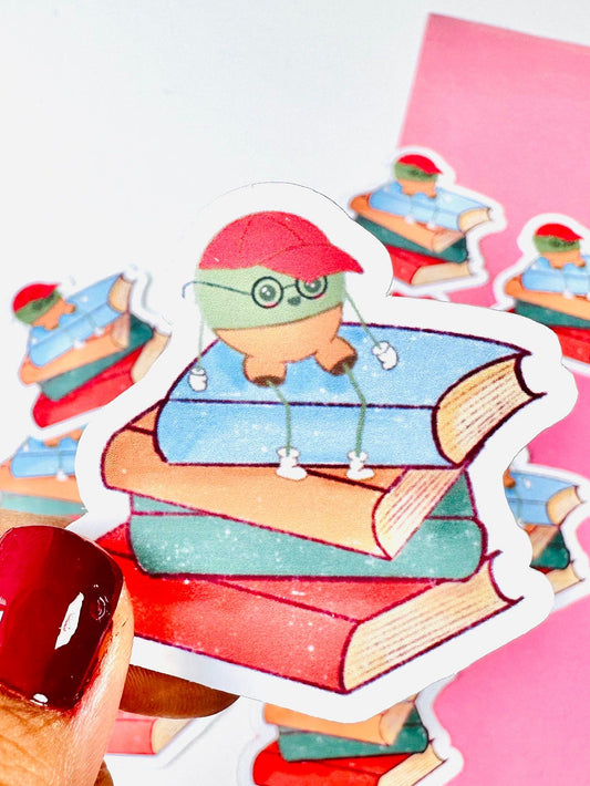 Mr Pea on Stack of books vinyl sticker held up